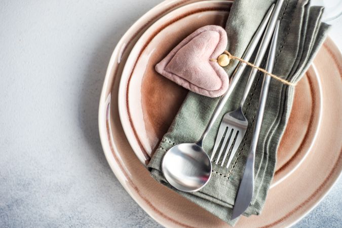 Pastel table setting for Valentine's day with felt pink heart