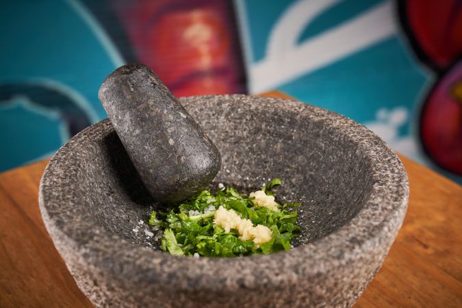 Onion in mortar with pestle