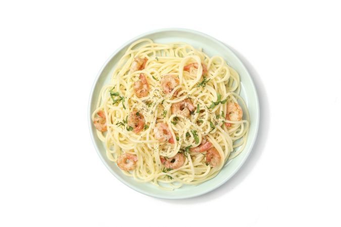 Plate with tasty pasta isolated on plain background
