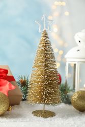Christmas lantern and tree on decorated background, space for text