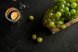 Glasses with wine and grapes