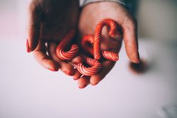 Woman holding candy canes