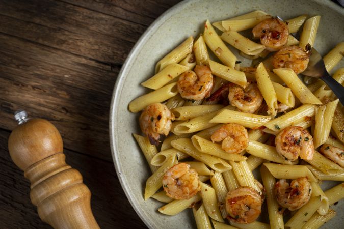 Penne pasta with grilled shrimp.