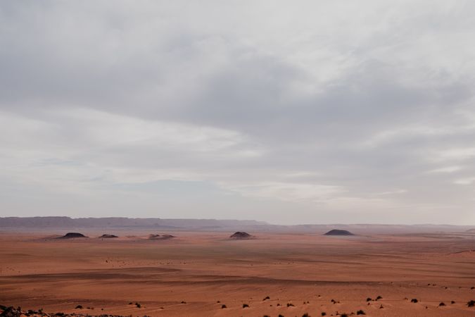Sunset sky over hills in desert
