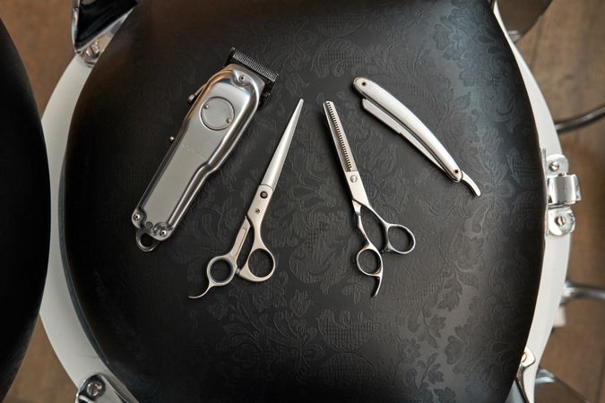 Set of various tools on barber chair