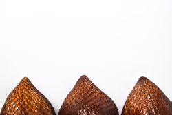 Tops of three salaks, snake skin fruit