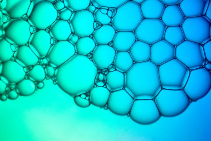 Abstract background bio technology, macro photography foam and water with gradient background. Molecule multicolor backgorund