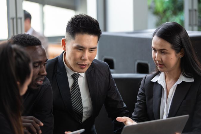 Group of diverse business people having an online client consultations