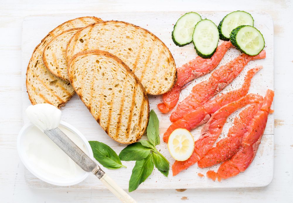 Top view of toasted bread with smoked salmon
