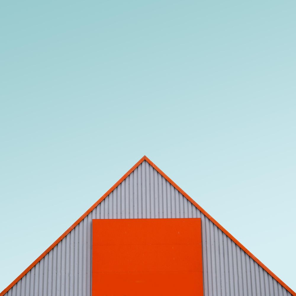 A triangle against a blue sky