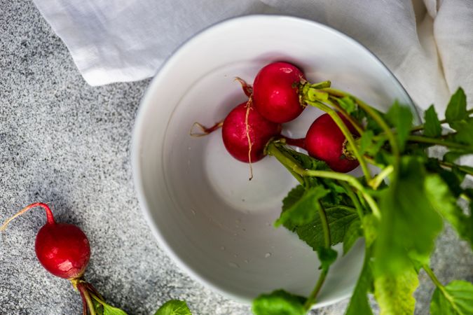 Top view of bowl of fresh radishes