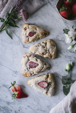 Strawberry scones on marble table