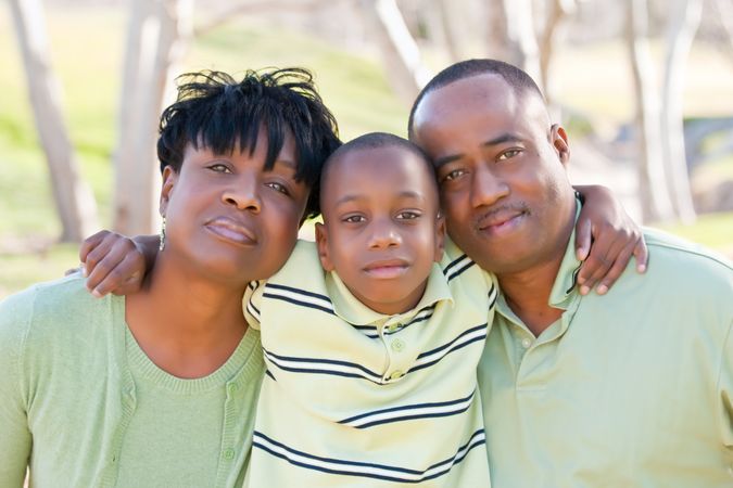 Happy Black Man, Woman and Child
