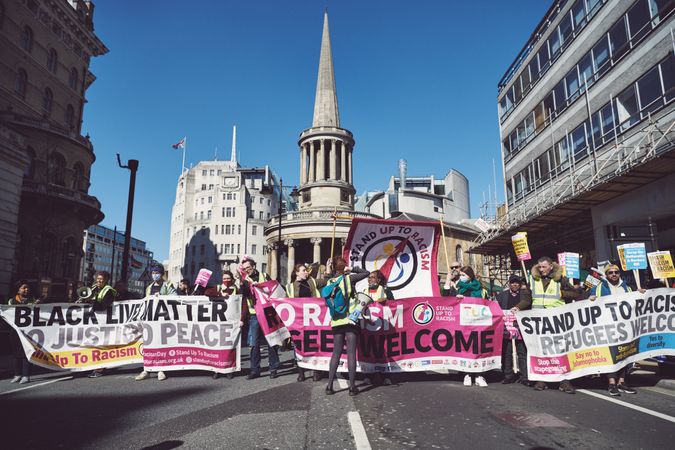 London, England, United Kingdom - March 19 2022: Large group with banners in London