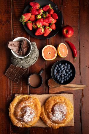 Breakfast food and drink on wooden table