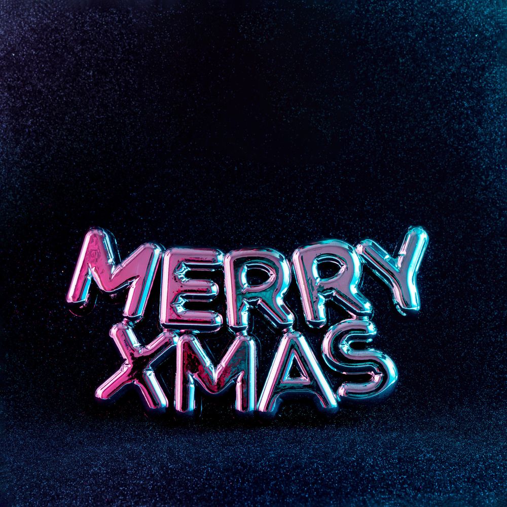 “MERRY XMAS” in vivid neon colors on dark background