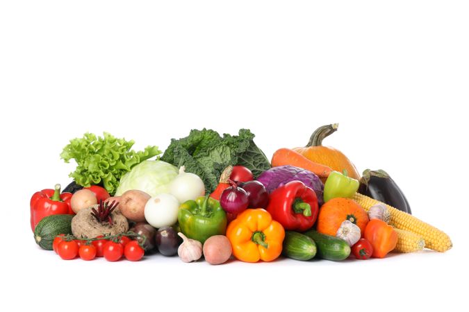 Composition with fresh vegetables isolated on plain background