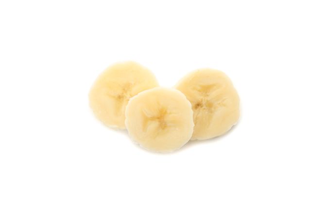 Banana slices isolated on blank background. Fresh fruit