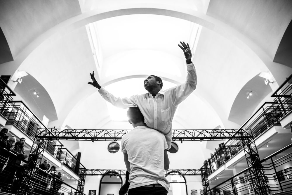 MONTREAL, QUEBEC, CANADA – March 16 2019- Man holds another man up in a dance studio