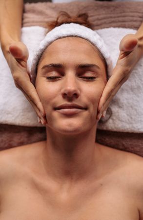 Beautiful  woman getting a face massage