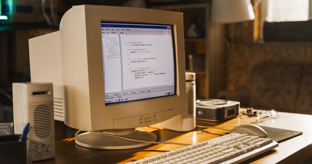 Dated PC Has Operating System Terminal Opened, Prompts Running On Screen, Code Functioning Successfully.