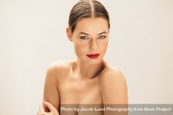 Close up portrait of beautiful  female model in studio with red lipstick 5r2A25