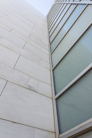 Looking up at facade of modern building