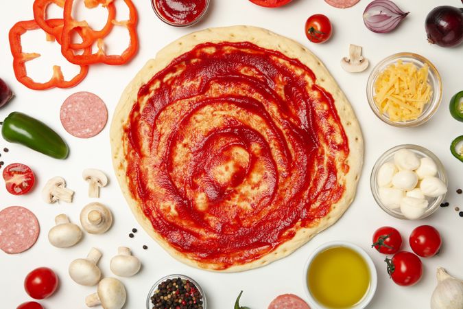 Ingredients for cooking pizza on plain background, top view
