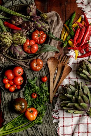 Assorted vegetables and napkins on table