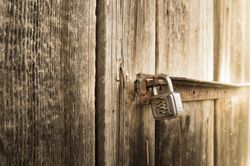 Metal lock on old barn