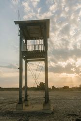 Observation tower at empty seashore