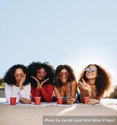Group of beautiful females hanging out at the beach 5a7Jdb