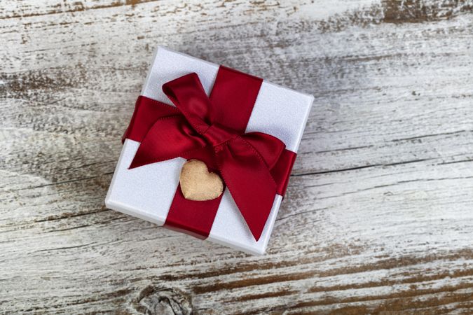 Valentine’s day gift box with gold heart on top
