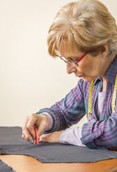 Dressmaker design tailor pattern on the table