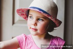 Portrait of girl in pink tank top wearing hat 5wkBW5
