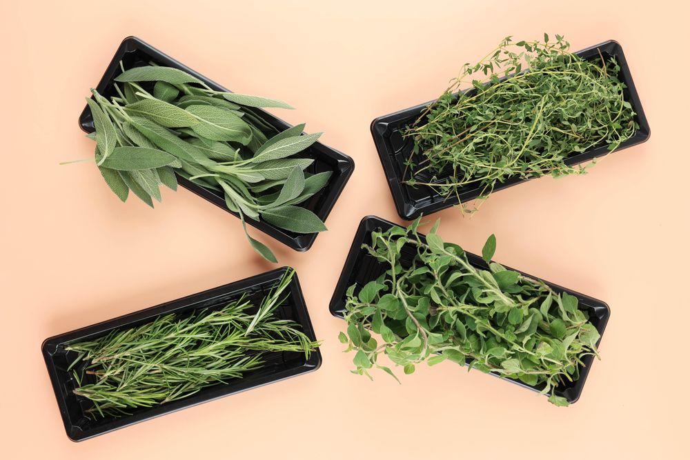 Top view of small containers of different herbs