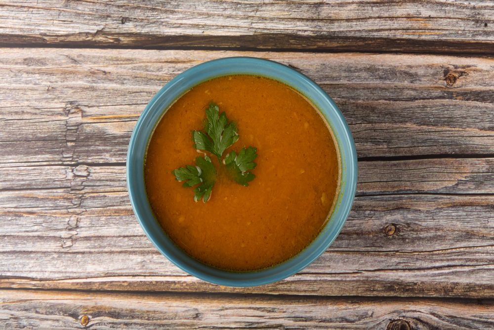 Delicious homemade pumpkin soup in bowl.