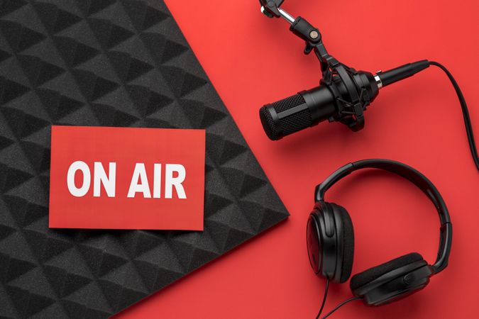 On air banner with mic and headphones