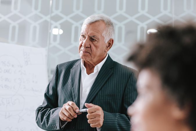 Mature businessman in conference room during a meeting