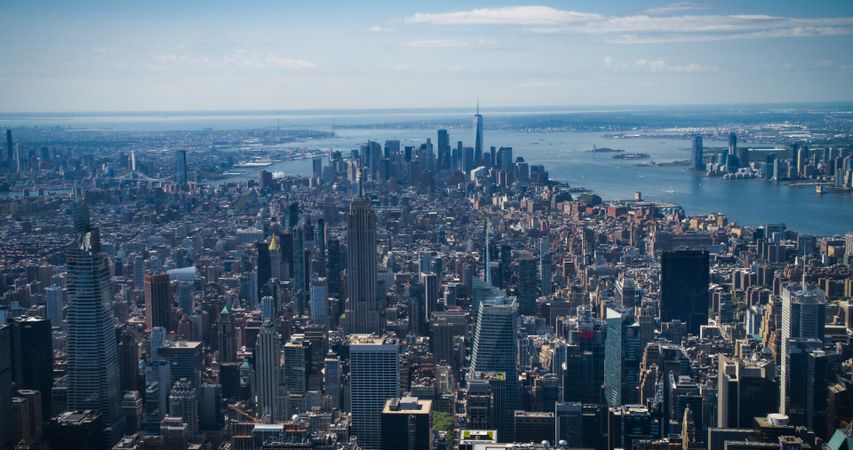 Scenic Aerial New York City View Towards Lower Manhattan Architecture. Panoramic Footage of Midtown Financial District from a Helicopter. Cityscape with Office Buildings and Skyscrapers