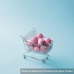 Shopping cart with pink Christmas decorations 5pplO5