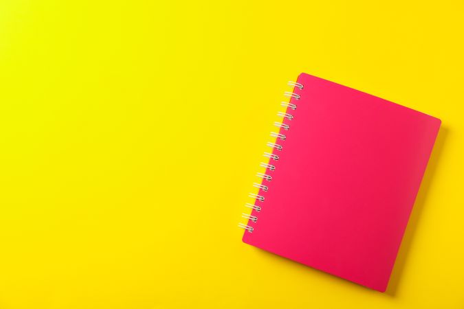 School copybook on color background, space for text