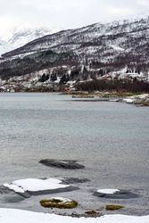 Amazing nordic seascape with mountains and village