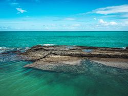 Rocks in clear waters at beach in Brazil