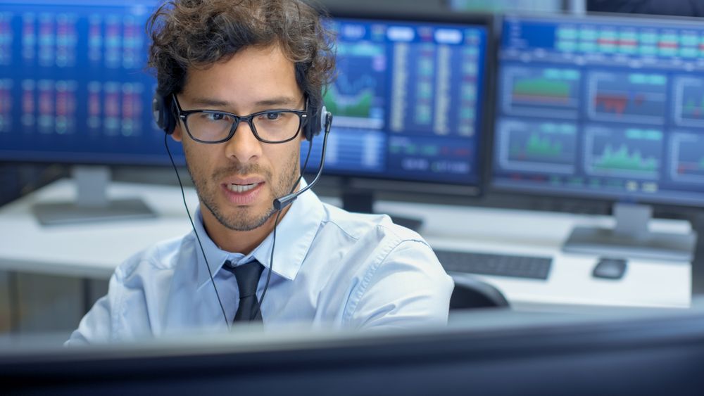 Broker Making Sales with a Headset