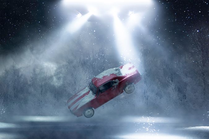 UFO Abducting a Snow-Covered Car