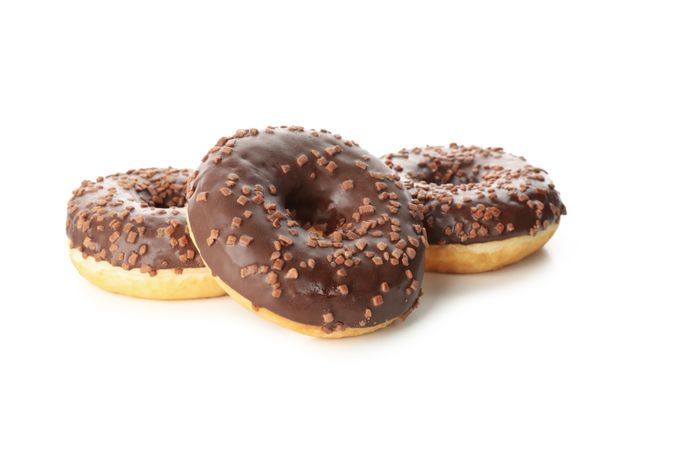 Tasty baked donuts isolated on plain background