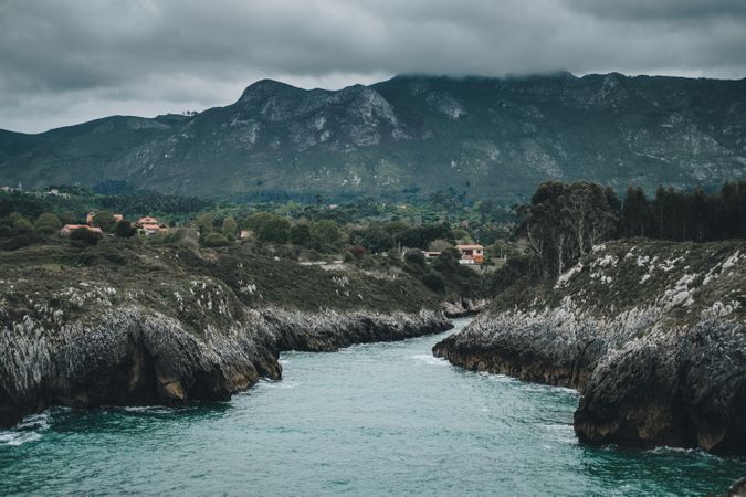 Mountain valley on sea background