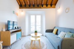 Cozy room with sofa and TV