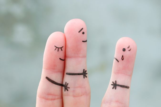 Fingers art of a man loving another woman